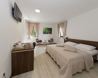 Guest House Plitvice Villa Verde - פליטביצ'קה יזרה - חדר שינה