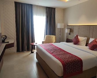 Vividus Sleek Aarya Mansion - Hassan - Hassan - Bedroom