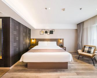Home Inn Plus Foshan Shunde Qinghui Garden Rt-Mart - Foshan - Bedroom