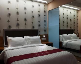 Hotel Bed and Breakfast Surabaya - Surabaya - Bedroom