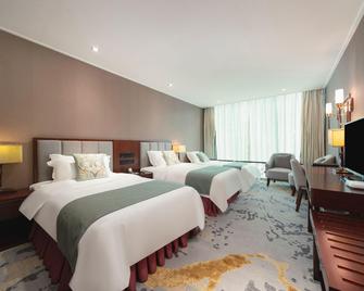 Nanning International Hotel - Nanning - Sovrum