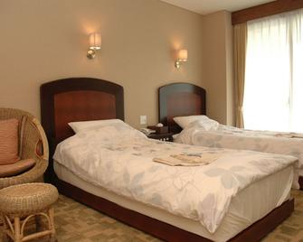 Hotel Luandon Shirahama - Shirahama - Bedroom
