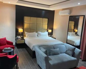 Rich-Bridge Hotel - Abuja - Schlafzimmer