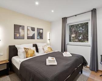 Charysma - Aurum-Suite, modernes & elegantes Design, Parkplatz, Terrasse - Hamelin - Phòng ngủ