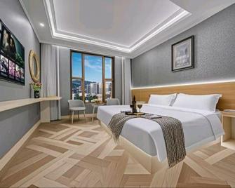 Fenghua Hotel - Ningbo - Tongren - Camera da letto