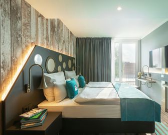 Holiday Inn - the niu, Brass Munich Olympiapark by IHG - Munich - Bedroom