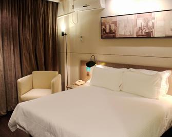 Jinjiang Inn Select Tianjin Tanggu Metro Station Zhongxin North Road - Τιαντζίν - Κρεβατοκάμαρα