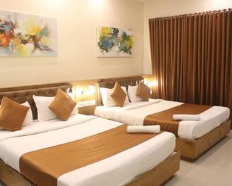Hotel Grandeur-Near Mumbai International Airport - Bombay - Habitación