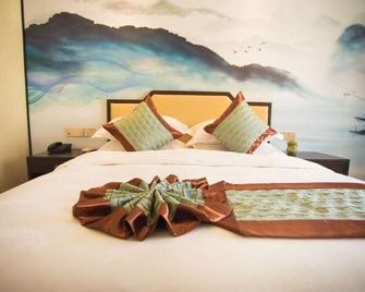 Zhongtie Xinyuan Hotel - هوانغشان - غرفة نوم