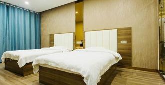 Super 8 Jiangdu Shangcheng Road Branch - Yangzhou - Bedroom