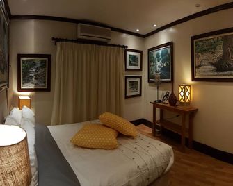 Stay at Amare 5BR Home Pacific Grand Mactan - Lapu-Lapu City - Schlafzimmer