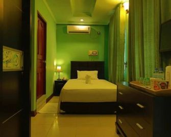 Grace Beach Inn - Malé - Habitación