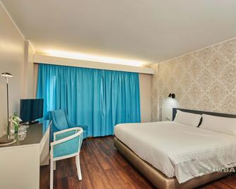 Urban Hotel Amadeos - Matosinhos - Schlafzimmer