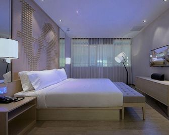 Orange Hotel Select (Tianjin Konggang Shengyu Building) - Tianjin - Bedroom