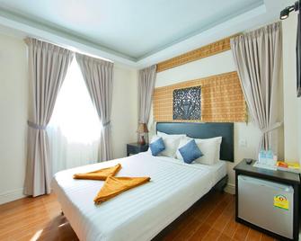 Naga Angkor Hotel - סיאם ריפ - חדר שינה