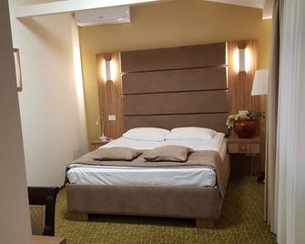 Hotel Tecadra - Voluntari - Camera da letto