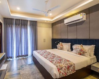 Hotel Js Souvenir - Dehradun - Schlafzimmer