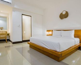 Lotus Bali Guest House - North Kuta - חדר שינה