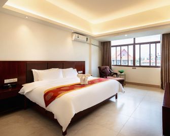 Tongfa Hot Spring Hotel - Wanning - Bedroom