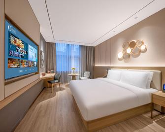 Orange Hotel Qingdao Wusi Square 3rd Yan'an Road - Qingdao - Bedroom