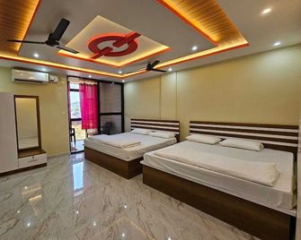 Ashwini Hotel And Lodging - Sirsi - Bedroom