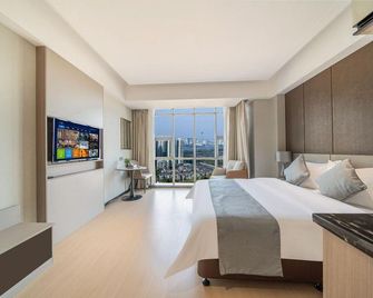 Left Bank International Hotel (Luoyang Museum Suitang Park) - Luoyang - Bedroom