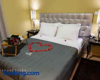 Hotel Tulipa - Bragança - Schlafzimmer