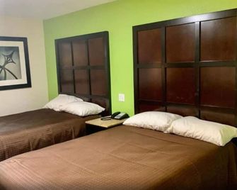 Sunrise Extended Stay Hotel - Montgomery - Habitación