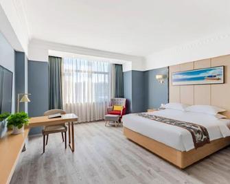 Chizhou Amethyst Hotel - Chizhou - Bedroom