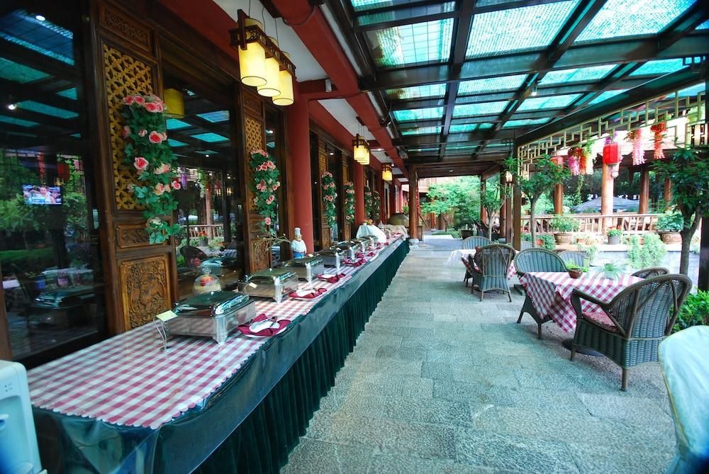 ليجيانغ جولدن باث هوسبيتاليتي - ليجيانغ - مطعم