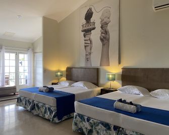 O Casarao Guesthouse - Willemstad - Slaapkamer