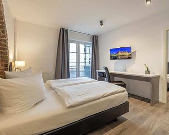 Hotel Ko15 - ליבק - חדר שינה