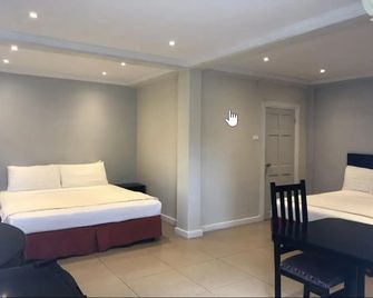 بامز هوتل ترينيداد - Arouca - غرفة نوم