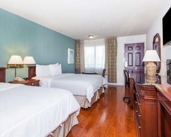 Days Inn & Suites by Wyndham Sunnyvale - סאניוייל - חדר שינה