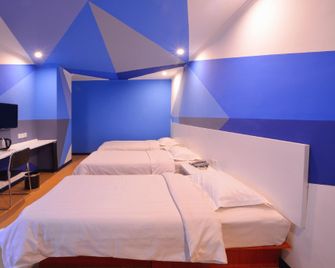 Jinkailai Boutique Hotel (Qingdao Beer Street) - تشينغداو - غرفة نوم
