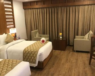 Hotel Karthika Park - Thiruvananthapuram - Bedroom