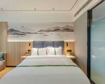Green Tree Inn Bozhou Weiwu Avenue Kangmei Wanda Zhixuan - Bozhou - Спальня