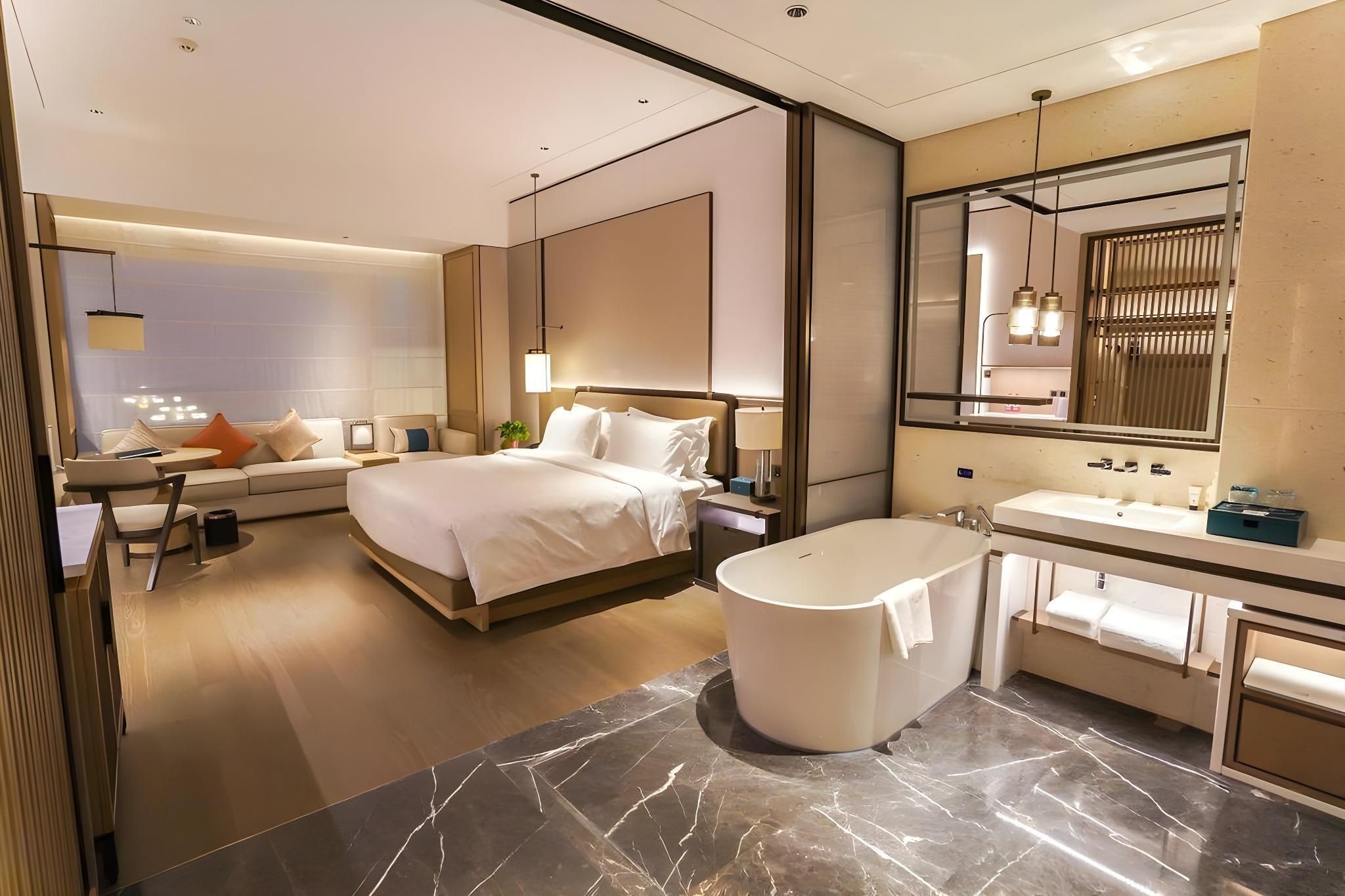 Zhangjiakou Grand Metropark Hotel - تشانغجياكو - غرفة نوم