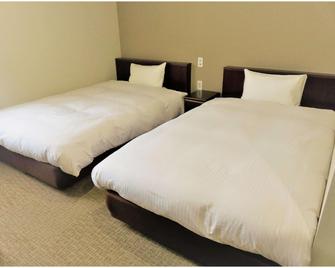 Riverside Hotel Omagari - Daisen - Schlafzimmer