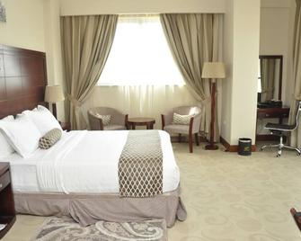 Addissinia Hotel - אדיס אבבה - חדר שינה