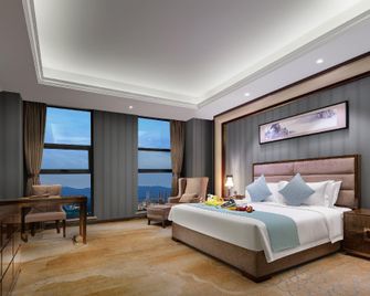 Chengkong Carrey International Hotel (Jingmen Railway Station Jingchu University of Technology) - Jingmen - Ložnice