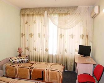 Hotel Asson - Termez - Termez - Camera da letto