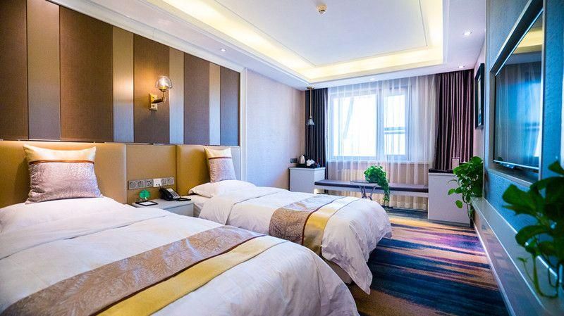 Oligar Select Hotel (Harbin Central Street Branch) - هاربين - غرفة نوم