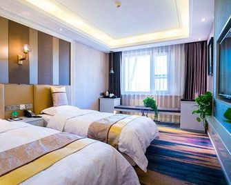 Oligar Select Hotel (Harbin Central Street Branch) - هاربين - غرفة نوم