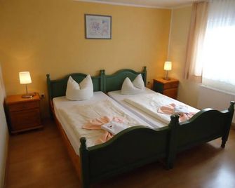 Hotel & Restaurant Beckmanns Winzerhaus - Urbar (Mayen-Koblenz) - Slaapkamer