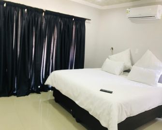 Coates Valley Lodge - Manzini - Camera da letto
