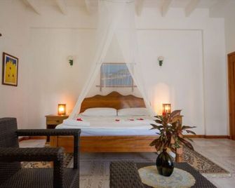 Zerof Guest House - La Digue Island - Phòng ngủ