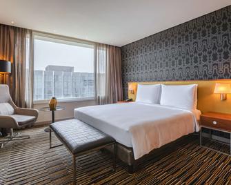 راديسون بلو أوكومي بالاس هوتل، ليبرفيل - ليبرفيل - غرفة نوم