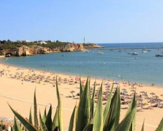 Vila Monte Luz - 1, Great apartment for 2 persons, pool, directly by the sea in prime location - Ferragudo - Strand
