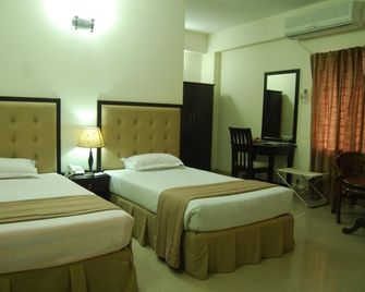 Ambassador Residency - Chittagong - Schlafzimmer